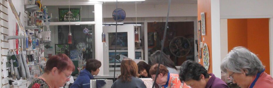 People working together in a craft or sewing workshop.